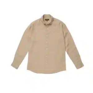 Beige long-sleeved button-up shirt by DEZHART displayed on Plain background.