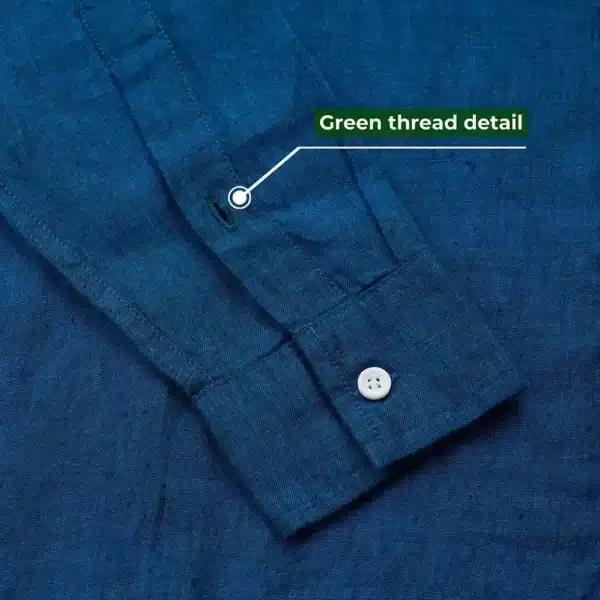 DEZHART shirt showcasing intricate green thread detail, by SITL Enterprise LLC.”